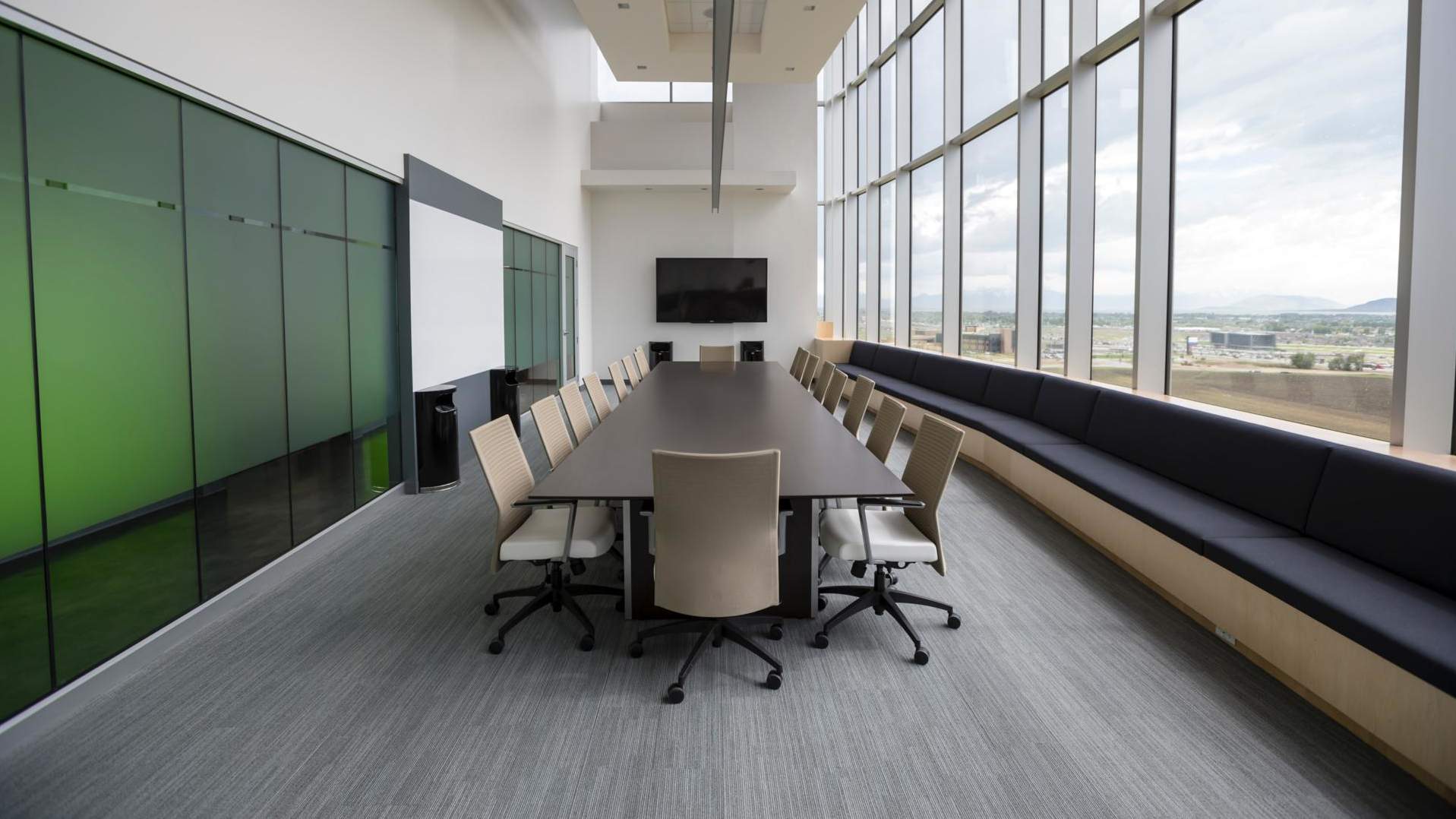 A photo of an empty meeting room to illustrate the remote workplace