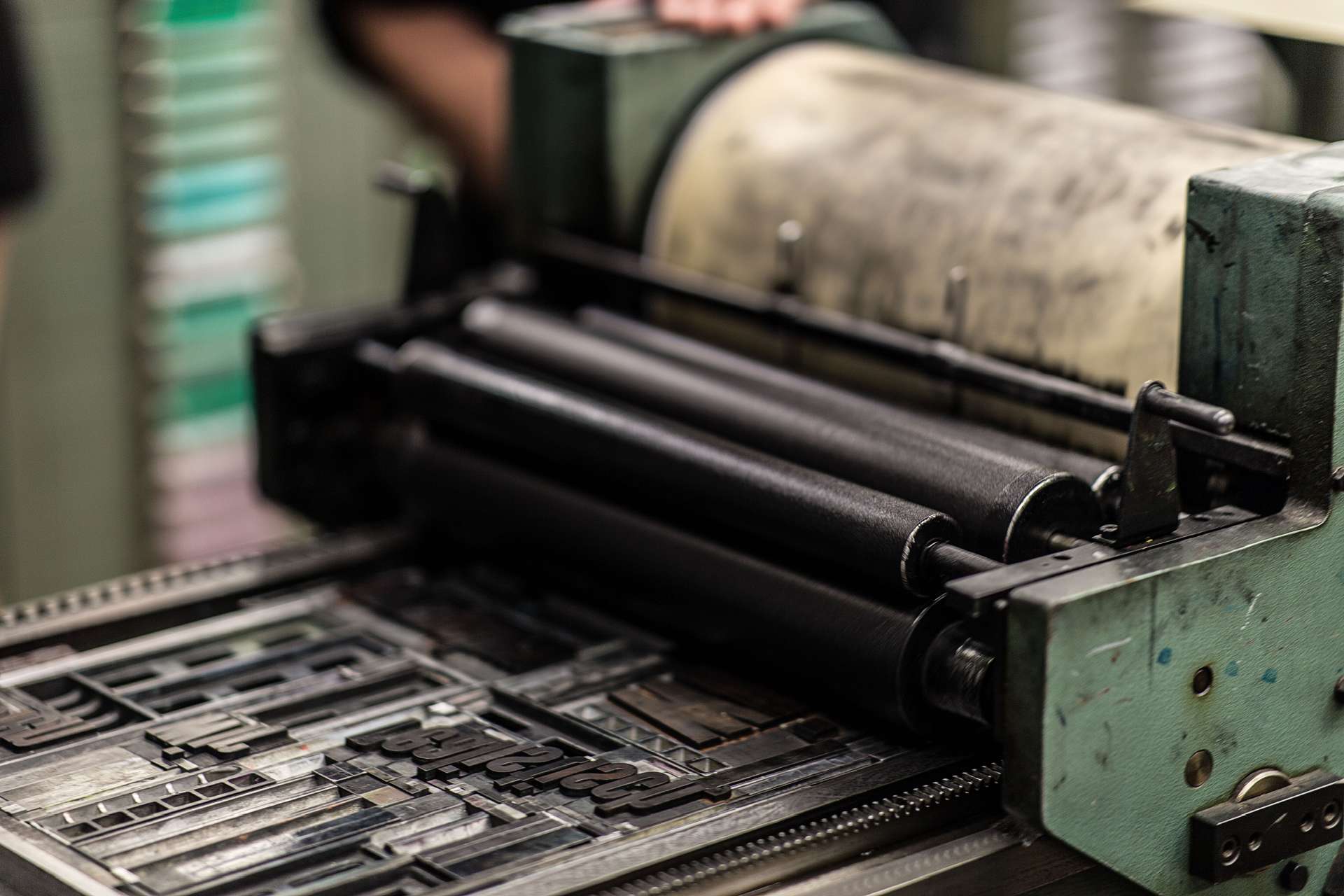 photo of a old letter press  printer by Wendelin Jacober on Pexels.com